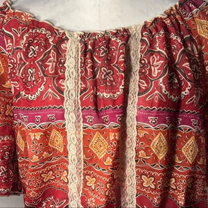 Lilly Lou top sz Lg. elastic and ruffled neckline‎ and drop waist line